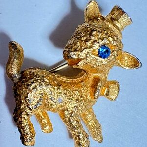 Vintage textured Gold tone Lamb Brooch with Blue eyes Accent